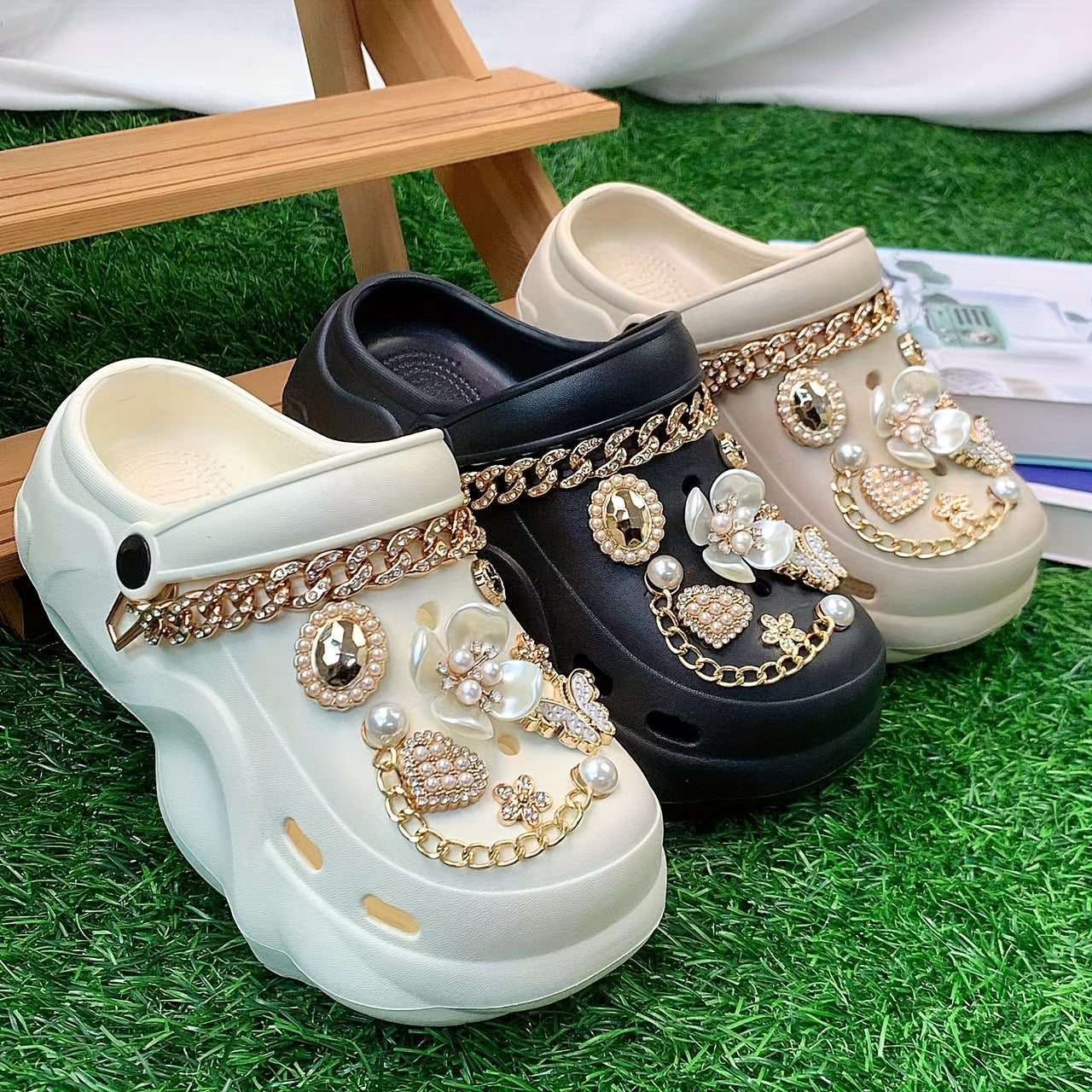 Fashionable And Trendy Women'S EVA Slip-On Shoes for Summer, Featuring Versatile And Stylish Hole Designs. The Shoes Are Adorned with White Five-Petal Flower Butterflies And Rhinestone Chains, Making Them Suitable for Home, B